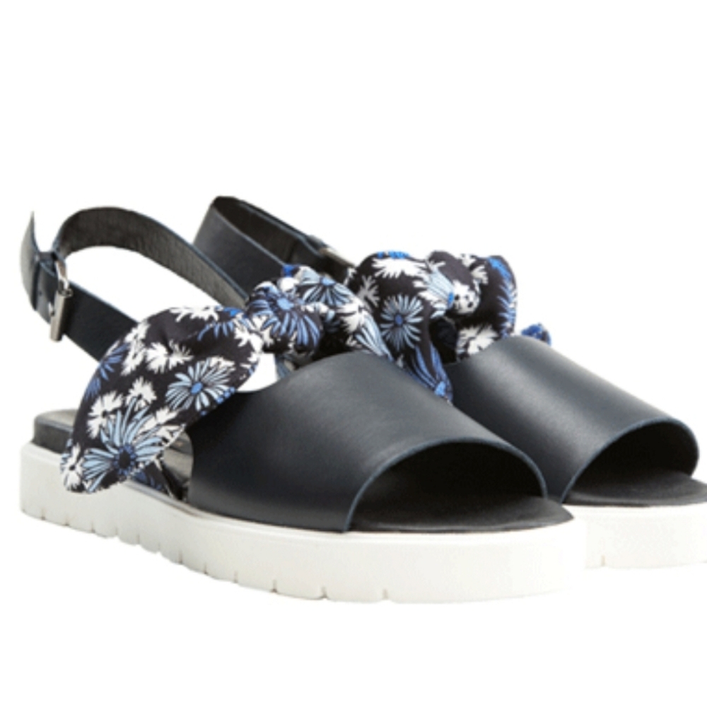 Mother of Pearl Ordell Bow Sandal, $330.